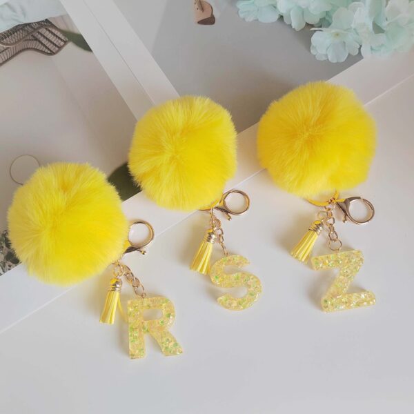 Wholesale Yellow letter ball pendant flower shaped letter keychain