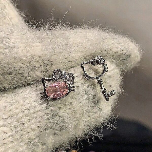 Wholesale Sweet and cool red snake wrapped cross earrings