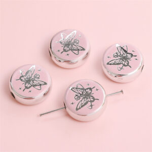 Flat disc-butterfly rose 18mm aperture about 2.5mm pink / 2/bag