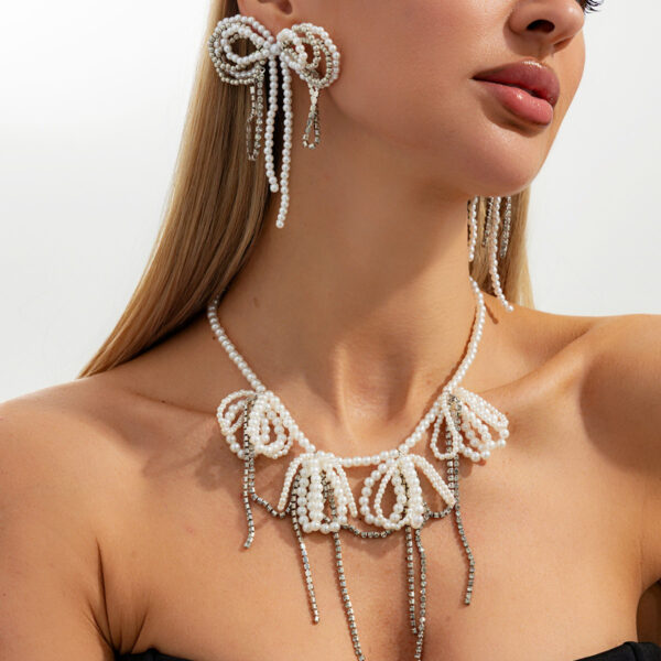 Wholesale Pearl bowknot diamond-encrusted chain tassel necklace