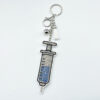 Wholesale Diamond-studded syringe keychain fashionable tassel pendant