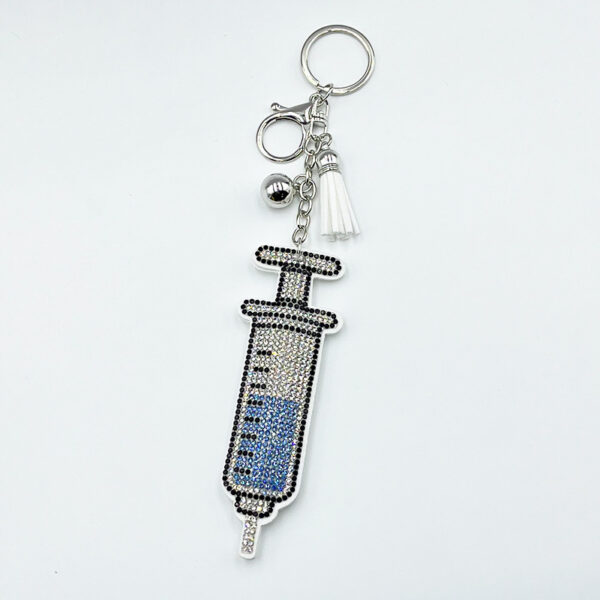 Wholesale Diamond-studded syringe keychain fashionable tassel pendant