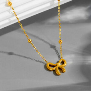X976 bow bead necklace gold