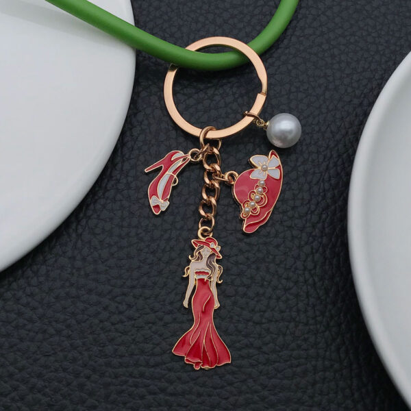 Wholesale Cross-border oil drop red alloy princess dress model hat high heels pearl keychain niche jewelry pendant