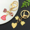 Wholesale Valentine's Day Oil Dripping Red Sprinkled Gold Heart Envelope Keychain