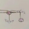 Wholesale Pink cartoon cat horseshoe ring earrings