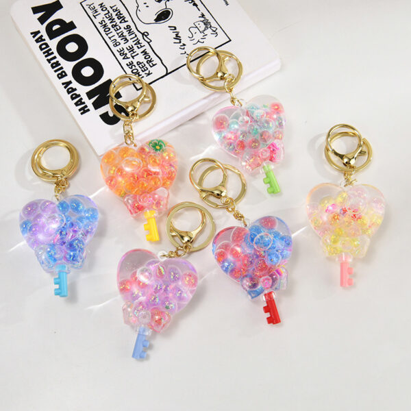 Wholesale Cartoon Oil Flow Sand Bottle Acrylic Keychain Car Keychain