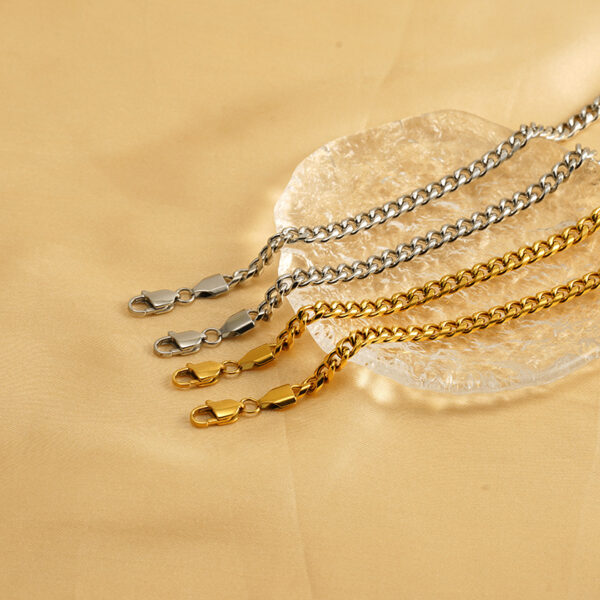 O1CN01cLaftG2NGHvIFr4jm_2217889189935-0-cib Wholesale Titanium steel interlocking rings gold and silver bracelet