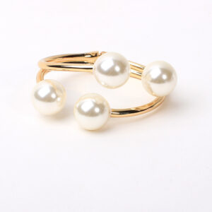 Four gold pearls