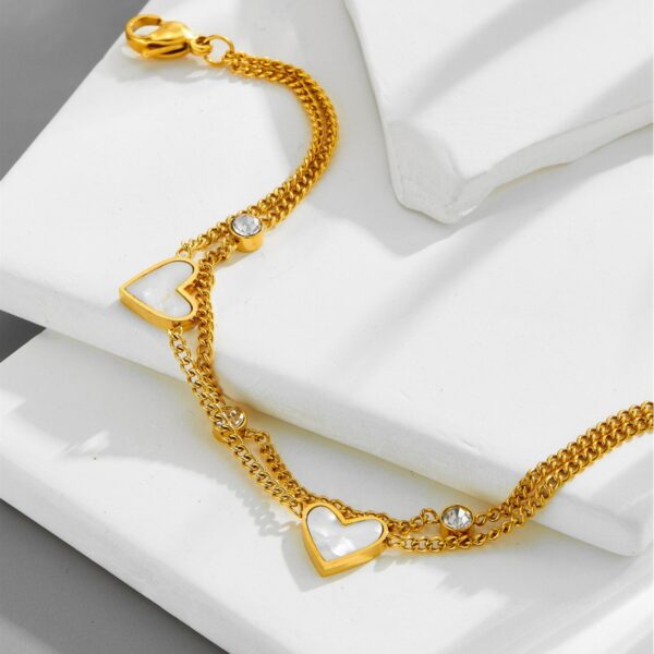 O1CN01cqR2MQ258LydJr8lF_2218546207481-0-cib Wholesale titanium steel 18K gold Titanium Steel Bracelets