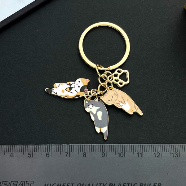 Wholesale three flowers/orange cat/blue and white 3 small simulation cute keychain