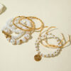 Wholesale Multi-layered Pearl Bracelet and Gold Bangle.