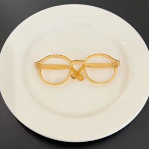 Translucent orange oversized glasses