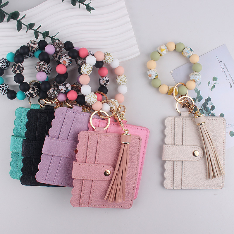 Wholesale Silicone Bracelet Solid Color Card Holder and keychain.