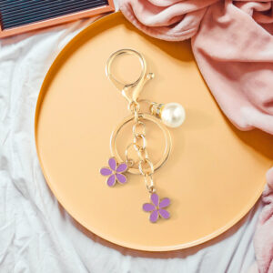 Purple five petal flower pearl keychain