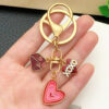Wholesale Valentine's Day Oil Dripping Red Sprinkled Gold Heart Envelope Keychain