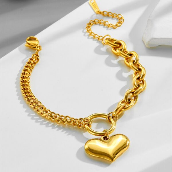 O1CN01e2p672258Lyczcvk6_2218546207481-0-cib Wholesale Retro Love Golden Titanium Steel Bracelet