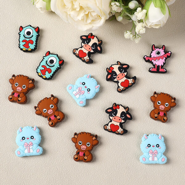 O1CN01e3ysFL1CRJTz94mg2_2217794230077-0-cib Wholesale 20pcs Creative Valentine's Day Teether Children's Food Grade Material Cartoon Animal Silicone Beads