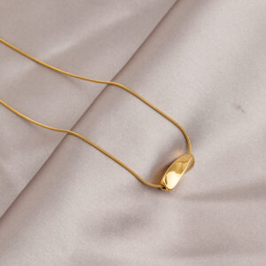 Gold mobius necklace