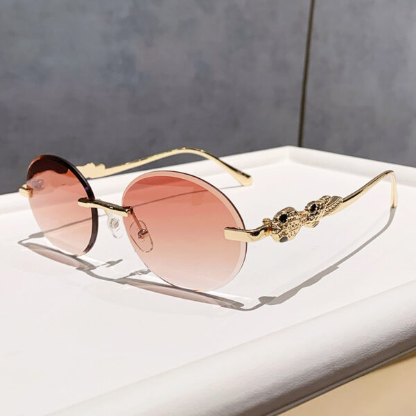 Wholesale Retro oval frameless sunshade sunglasses