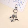 O1CN01eDWpag1WtWK4hSuh9_2220577792846-0-cib Wholesale Creative Ocean Beach Tower Shell Metal Keychain
