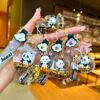 Wholesale Black gold floating cartoon cute panda keychain