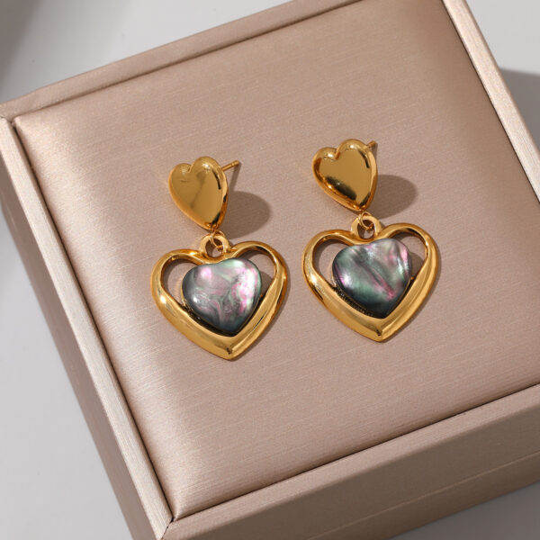 Wholesale Stainless steel heart earrings for women inlaid with cat's eye stone