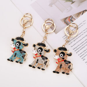 O1CN01fC1bbG27Kq2lnz6DE_2218648477779-0-cib Wholesale Cute Rhinestone Baby Cow Keychain