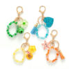O1CN01fF6aRq1DaIyIMbCvE_2219846820232-0-cib Wholesale Candy colored beaded tassel keychain