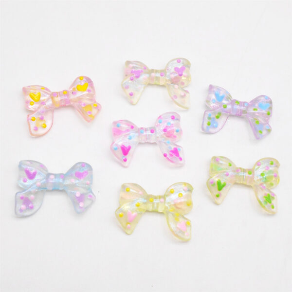 O1CN01fGmRaF1aeduehBHnW_2219135483355-0-cib Wholesale Acrylic Plated Cartoon Bow Loose Acrylic Beads