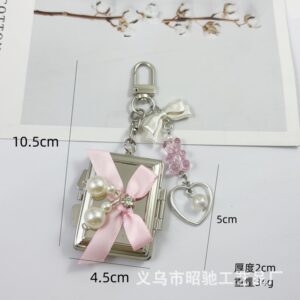 Rectangular pink ribbon bow mirror
