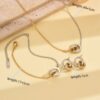 Wholesale Stainless steel gold and silver two tone circular single row rhinestone necklace bracelet and earrings
