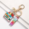 Wholesale Campus style graduation season wooden book keychain