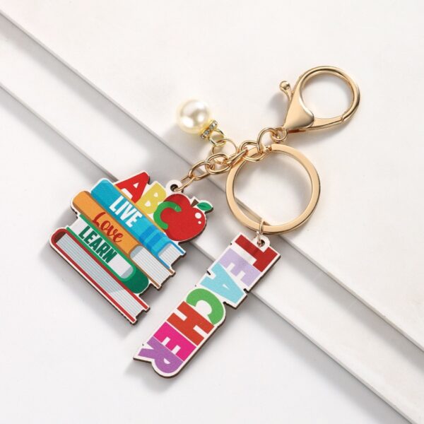 Wholesale Campus style graduation season wooden book keychain
