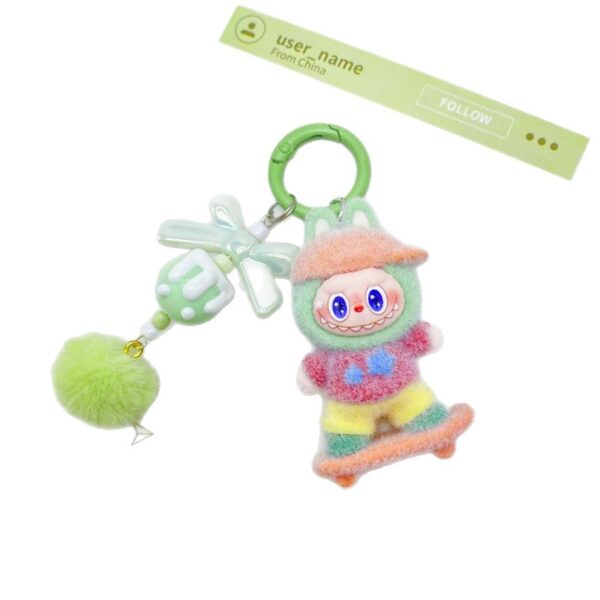 O1CN01fcalWn1qBMQW0d9cv_2219486535457-0-cib Wholesale Flocked Skateboard Cute Doll Keychain OLY Exclusive