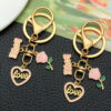 O1CN01fdX9bD2Kpbh4h6qzO_2217654629606-0-cib Wholesale Valentine's Day Pink Love Heart Rose Keychain