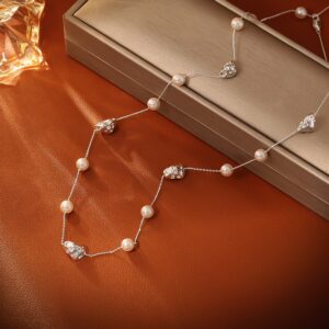 Broken silver pearl necklace