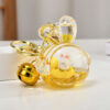 Wholesale Acrylic rabbit oil flow sand bottle keychain