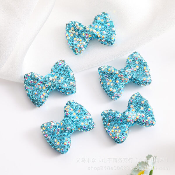 O1CN01fxMUqO1okxwJB0gp3_2218132465264-0-cib Wholesale Gypsophila Clay Straight Hole Bow 29*21 Bow Tie Beaded
