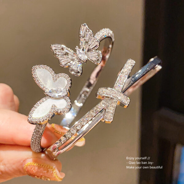 Wholesale Butterfly studded diamond cross buckle bracelet