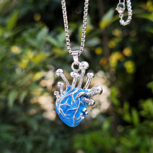 O1CN01fzhRIu2IVKo4NXQjn_3919529291-0-cib Wholesale Gold night light human heart pendant necklace