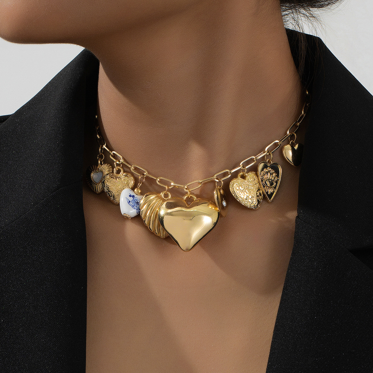 Wholesale Vintage multi-element metal tassel heart-shaped necklace