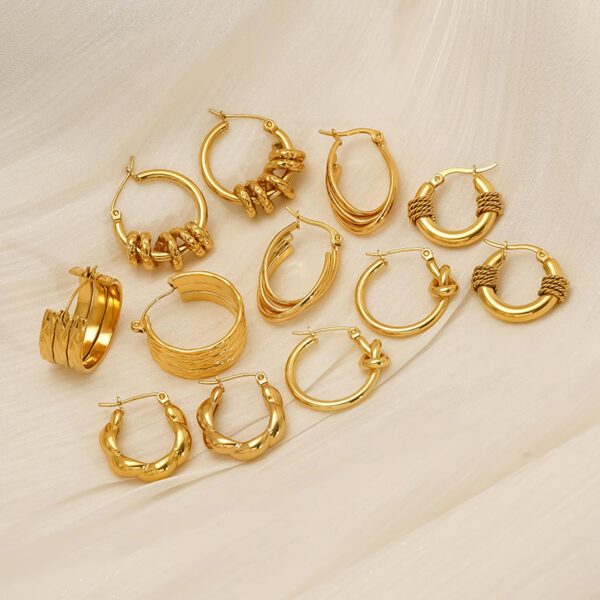 O1CN01g3UVTt2NGI0lIqNQQ_2217889189935-0-cib Wholesale Stainless steel wrapped gold geometric earrings