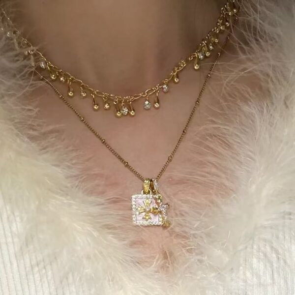 O1CN01g5o5of1m65LX5ci7y_2209494864904-0-cib Wholesale Cross solid dice pendant necklace