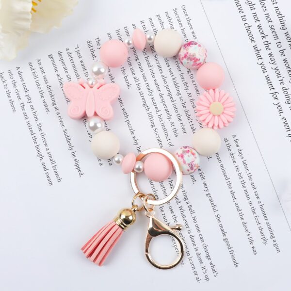 Wholesale daisy silicone printed wooden bead keychain bracelet key pendant