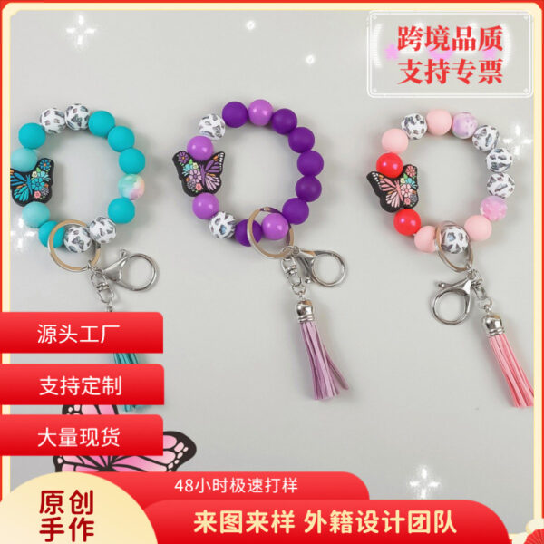Wholesale Butterfly Pendant Beaded Keychain Solid Color Silicone Wooden Keychain