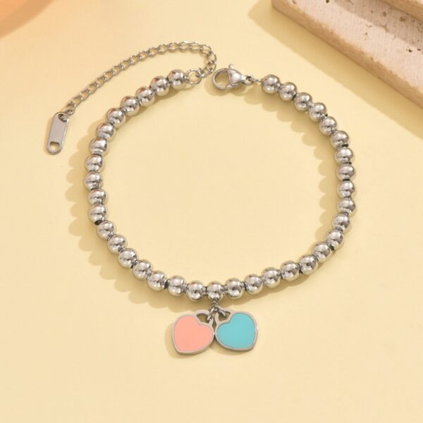 O1CN01gVwu751MqBCdpDVfH_2212889381485-0-cib Wholesale Stainless Steel Powder Blue Double Heart Bracelet