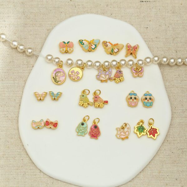 Wholesale diy lily of the valley flower pendant butterfly beaded cartoon alloy bracelet necklace clothing aessories jewelry fresh magpie