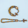 O1CN01h22S4M1RxZitj6fHO_2220646552178-0-cib Wholesale Wooden cross rosary woven Easter necklace