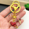 Wholesale Valentine's Day Oil Dripping Red Sprinkled Gold Keychain